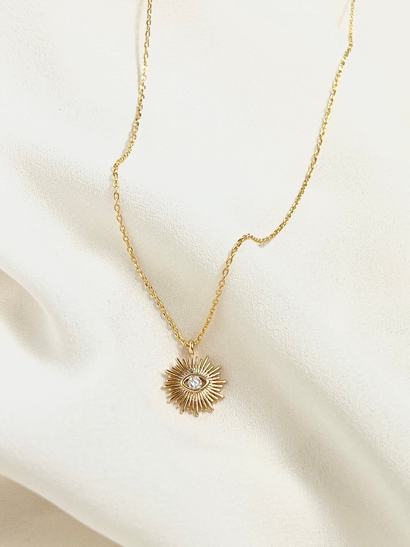 Gold Sun Evil Eye Charm Necklace