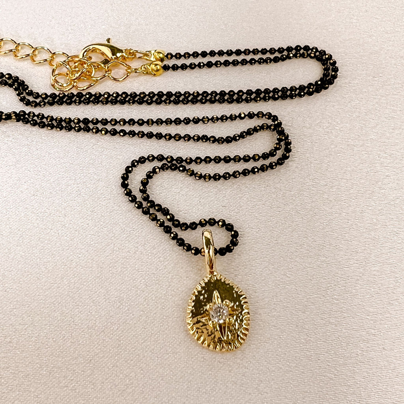 Starbrite Necklace in Black and Gold